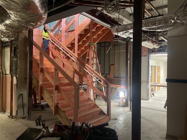 Temporary stairs provide egress for third-floor classrooms